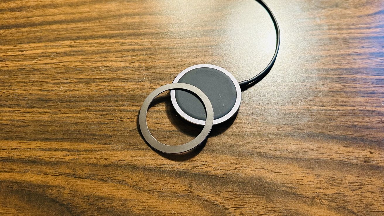 A magnetic charging puck, and a magnet to help non-MagSafe devices charge.