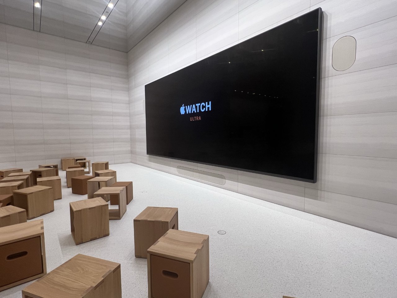 Today at Apple has one large monitor, and a mirror ceiling