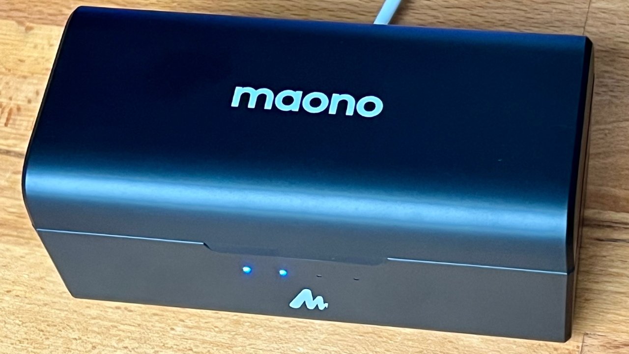 Maono WM821 wireless microphone system comes with a charging case