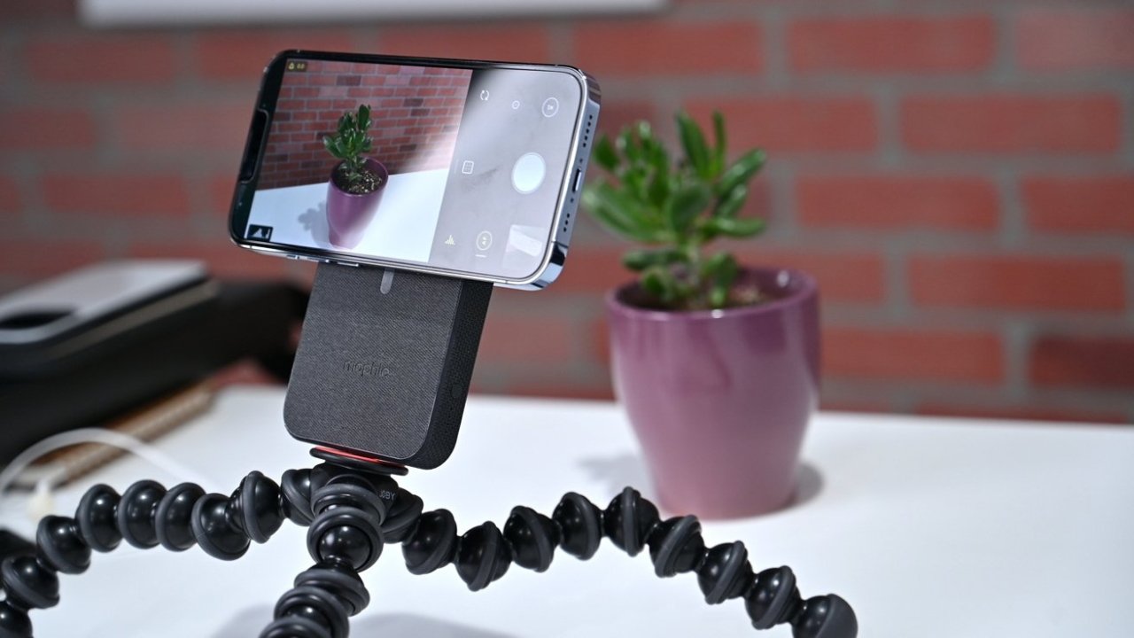 You can mount your phone on the Snap+ Powerstation and secure it to a tripod