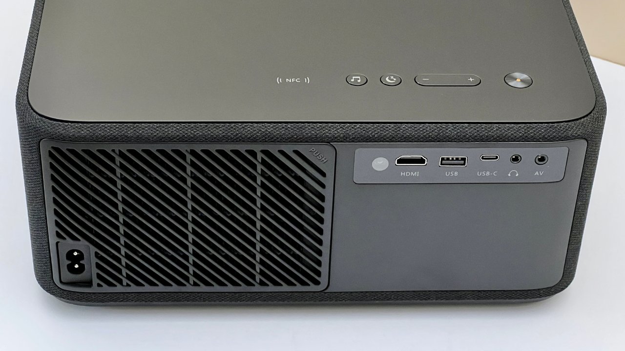 The projector has five ports at the back: an HDMI port, a USB port, a USB-C port, an AV port, and a power port