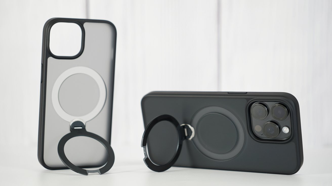 Two Torras iPhone cases are on a white tabletop with the rings open so they stand in different orientations