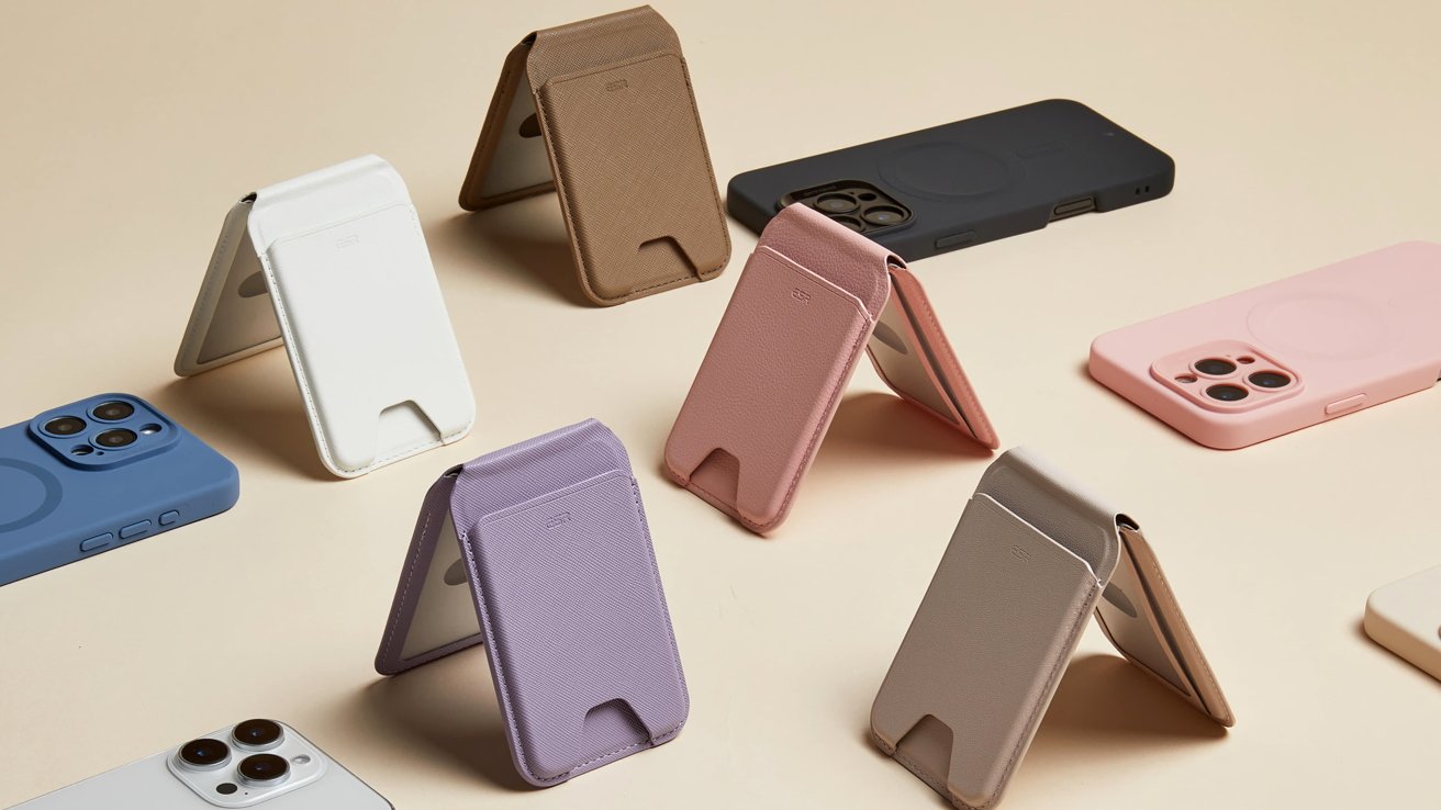 Colorful phone cases and matching stands arranged on a beige background.